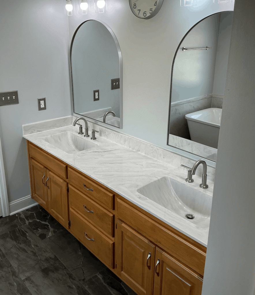 Updated bathroom with low-maintenance cast marble surfaces