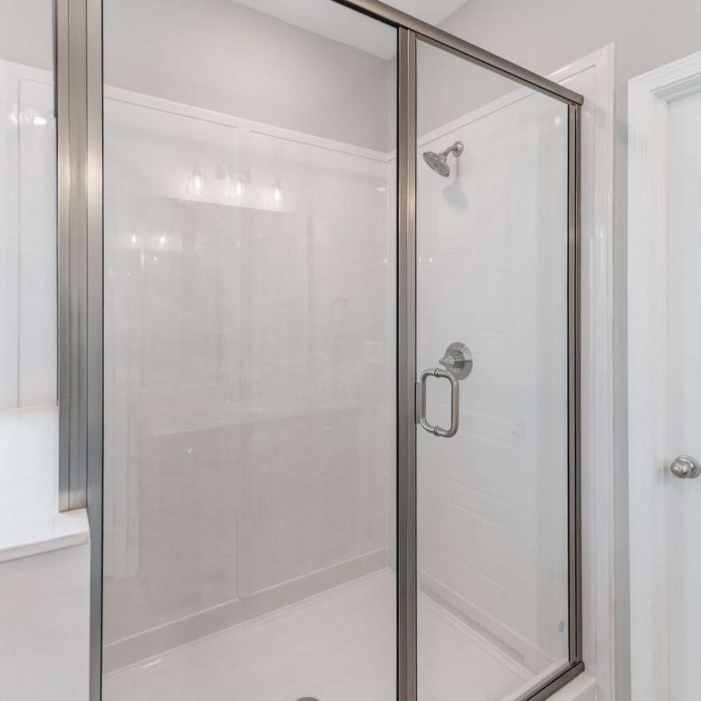 Compare marble vs acrylic shower systems, including durability, maintenance, style, and value to find the best fit for your bathroom remodel.